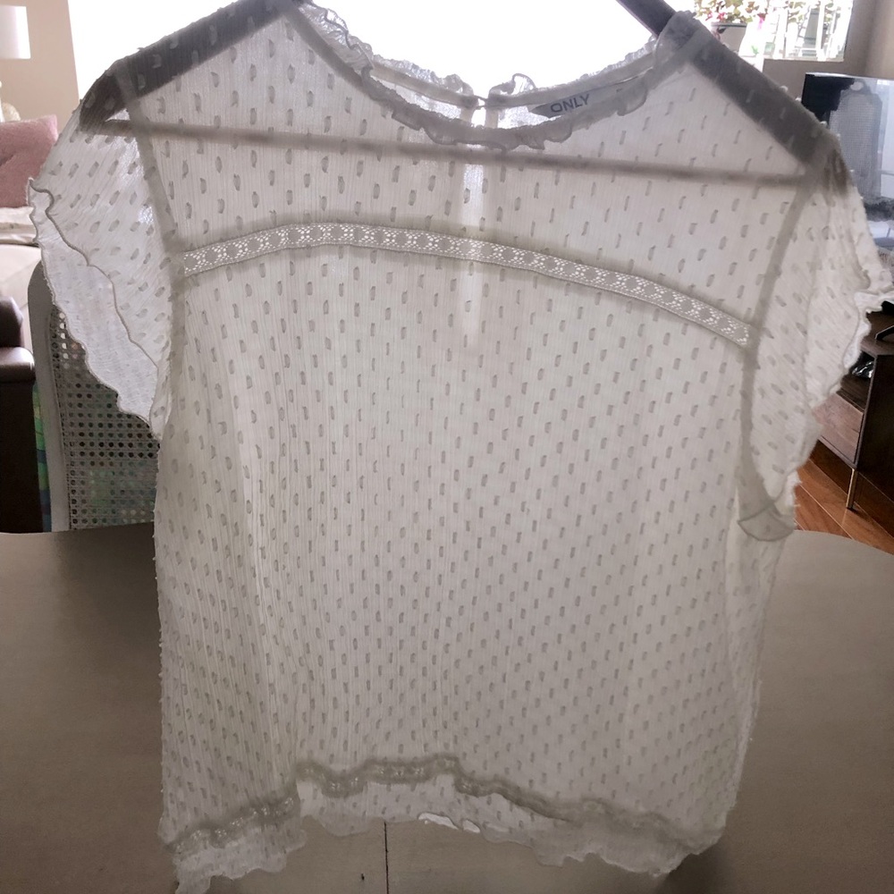 Only brand capped sleeve blouse, comfortable loose fit  size medium.